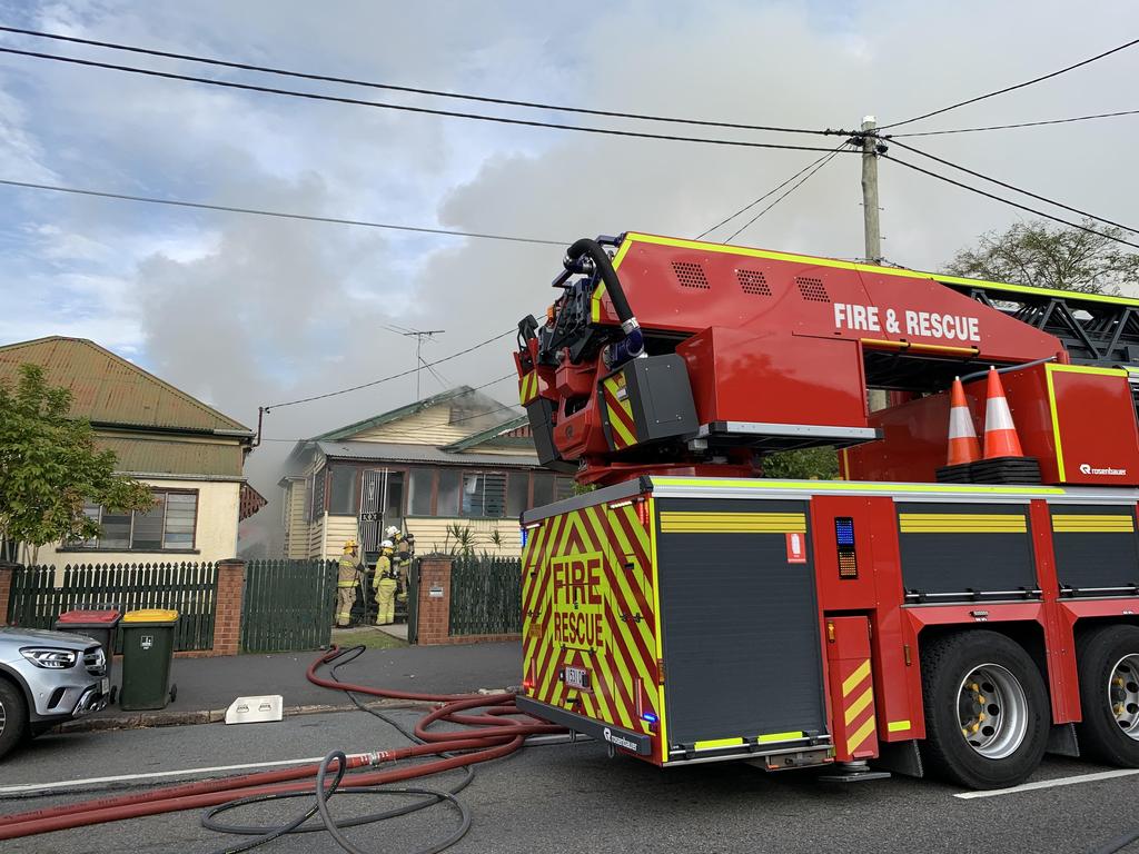 The scene of a house fire on Merthyr Road in New Farm. Picture: Tertius Pickard