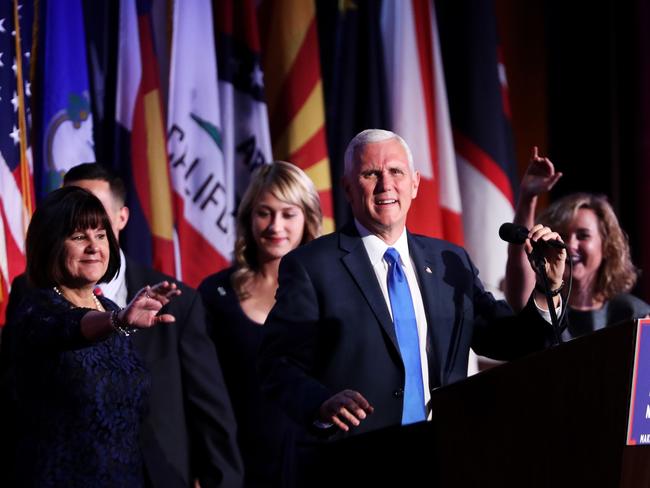 Vice president-elect Mike Pence (C) with his family speaks to supporters ahead of Donald Trump’s speech. Mr Pence was thanked right at the end of the President-Elect’s speech. Picture: Spencer Platt/Getty Images/AFP