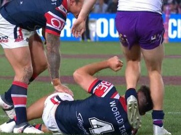 Cameron Munster kicks Joseph Manu during last year’s grand final.