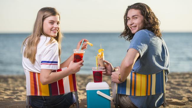 Lottie Aaron and Leon Omichi enjoying food from the Paper Fish kiosk at Stokehouse. Picture: Eugene Hyland