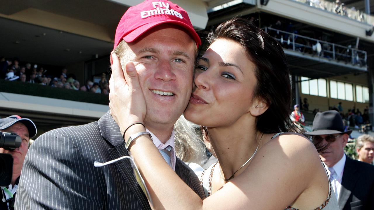 Danny O’Brien is congratulated by then girlfriend, Nina Begagig, after Valedictum won the 2005 Emirates Stakes at Flemington. Picture: Nicole Garmston