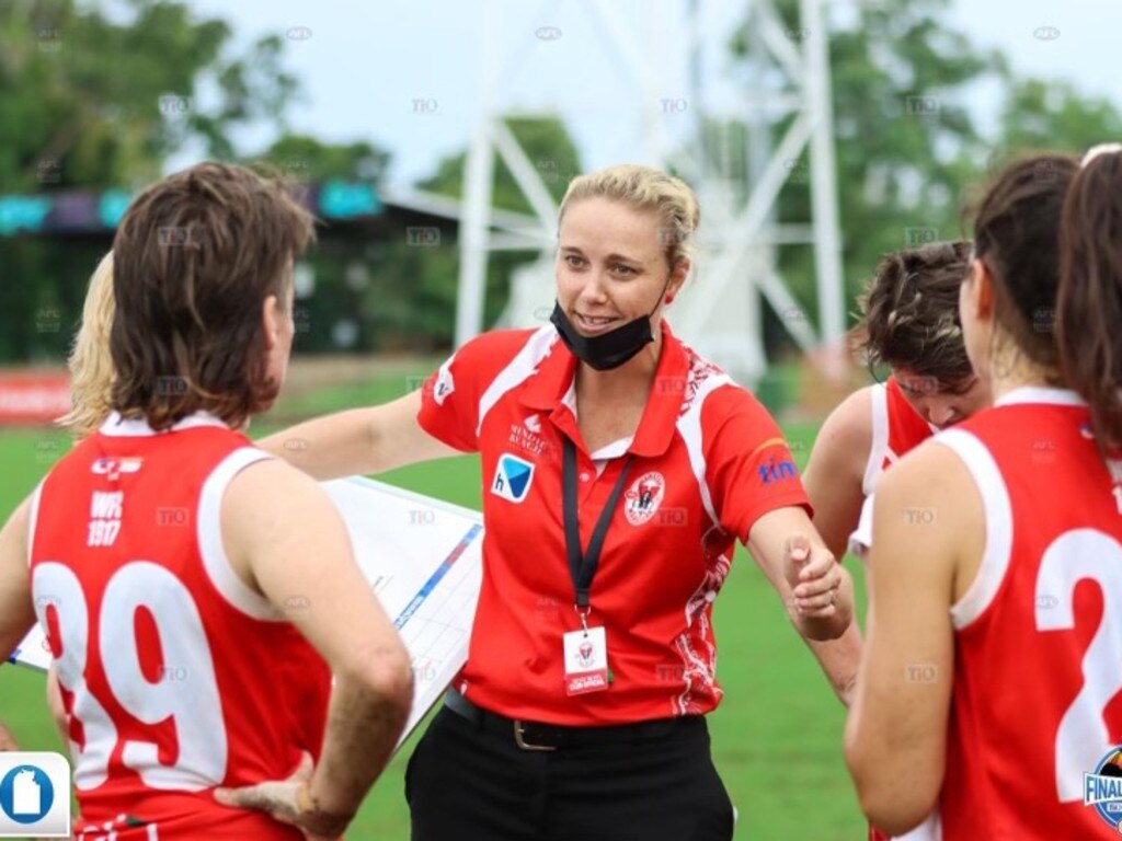 AFL NT premier women's Waratah coach Heidi Thompson instructing the girls on play. Picture: supplied.