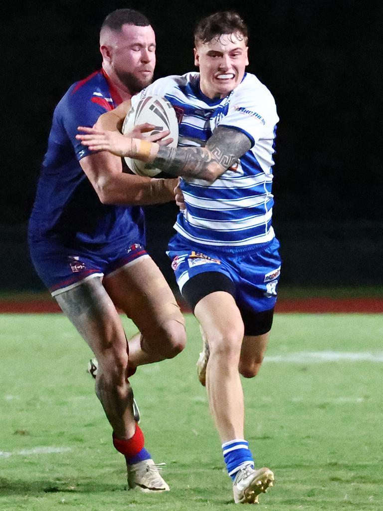 Dallas Skardon catches James Evans in the North Queensland Rugby League (FNQRL) A Grade semi final match between the Cairns Brothers and the Ivanhoe Knights. Picture: Brendan Radke