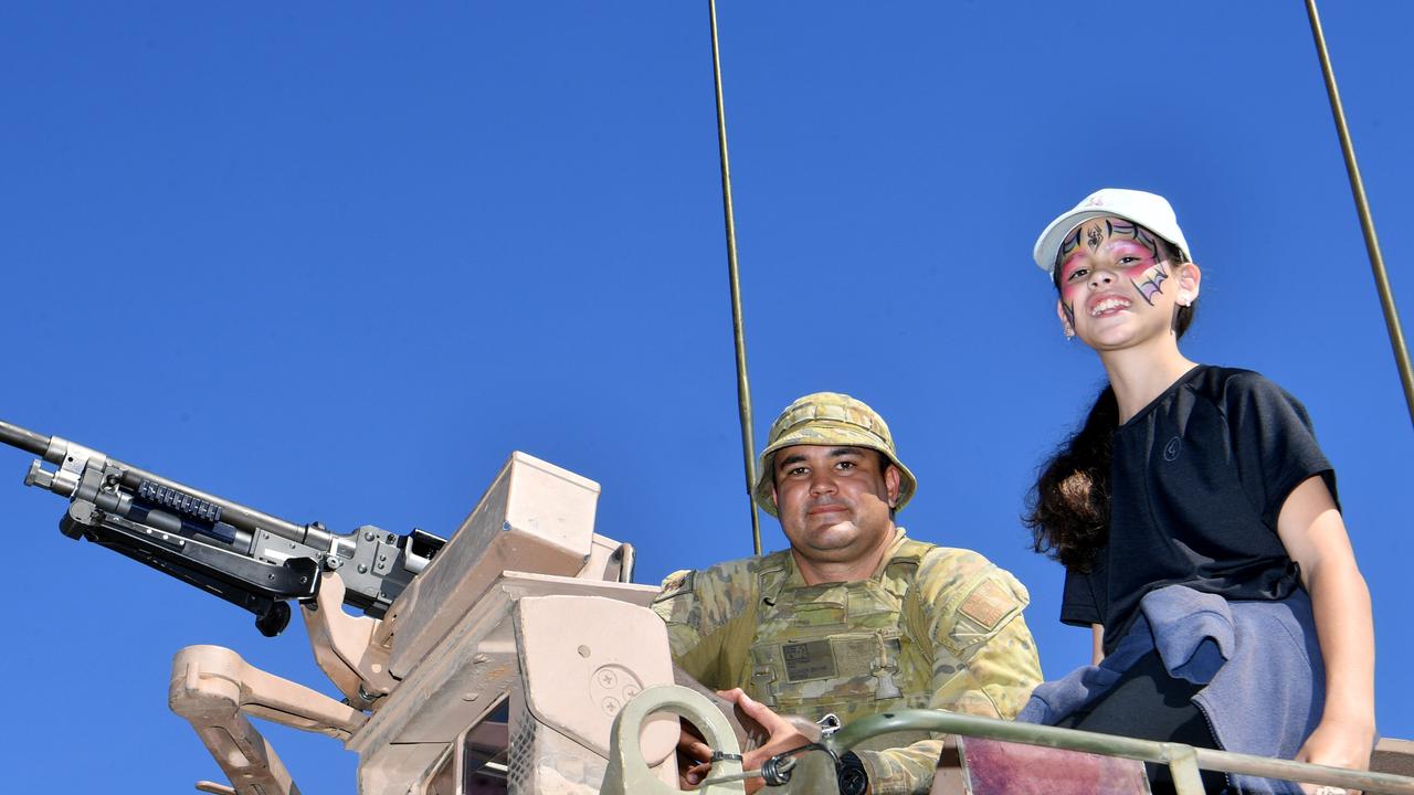 Legacy Centenary Torch Relay and community day at Jezzine Barracks. Tropper Jackson Brown from 2nd Cav with Celeste de Leur, 11. Picture: Evan Morgan