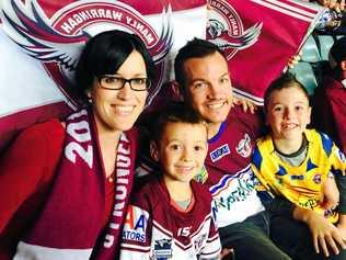 PASSIONATE FANS: Sean Peckover with wife Belinda and sons Hayden and Joel. Picture: Contributed GLA261217SEAN