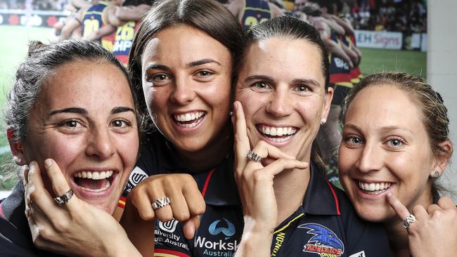 Angela Foley, Ebony Marinoff, Chelsea Randall, and Marijana Rajcic with their premiership rings. Picture SARAH REED