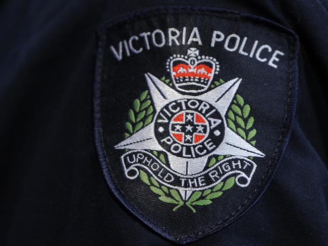 Victoria Police logo as seen at the Victoria Police Centre in Melbourne, Tuesday, Oct. 8, 2013. Victoria Police have announced they are investigating up to three members over possesion of performance enhancing drugs. (AAP Image/Julian Smith) NO ARCHIVING