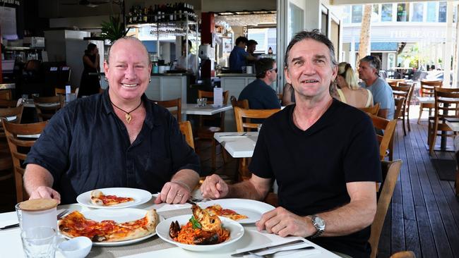 L'Unico Trattoria owners and hospitality stalwarts and good mates Matthew Turner and Stuart Spencer are proud to have served generations of Cairns locals at their seaside Italian restaurant. Picture: Brendan Radke