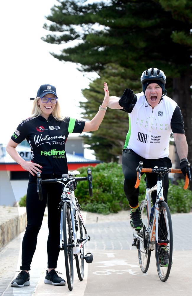 Andrew Jarman with his daughter Charlie at Henley Beach. They are both riding in Road Raise for CanTeen — Adelaide to Melbourne in October. Photo: Tricia Watkinson.