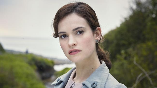 FOR SUNDAY ENTERTAINMENT USE ONLY UNTIL 16 APRIL 2018 PRINT USE ONLY 15 APRIL, ONLINE EMBARGO UNTIL 16 APRILLily James plays Juliet Ashton in a scene from film The Guernsey Literary and Potato Peel Pie Society