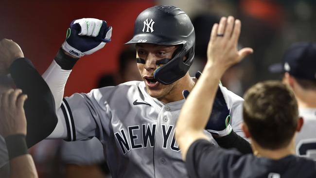 ANAHEIM, CALIFORNIA - AUGUST 29: Aaron Judge #99 of the New York Yankees celebrates his 50th home run of the season against the Los Angeles Angels in the eighth inning at Angel Stadium of Anaheim on August 29, 2022 in Anaheim, California. Michael Owens/Getty Images/AFP == FOR NEWSPAPERS, INTERNET, TELCOS &amp; TELEVISION USE ONLY ==