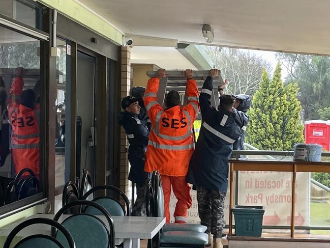 Just after midday SES and army workers arrived at the bowling club. Picture: Odessa Blain.