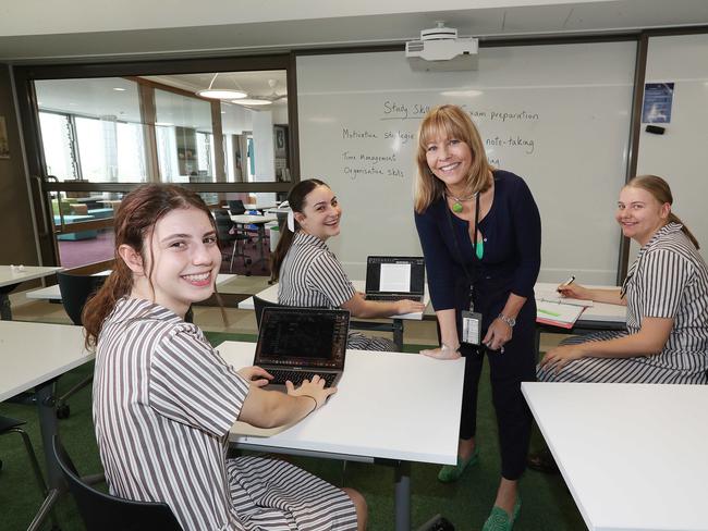 Teacher Amanda Wallas with senior students Gaby Wade, Beth Seccombe and Caitlin Wasmund-Loughman. Picture: Annette Dew