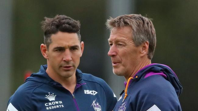 MELBOURNE, AUSTRALIA — MAY 16: Billy Slater of the Melbourne Storm and Storm coach Craig Bellamy talk during a Melbourne Storm NRL media session at Gosch's Paddock on May 16, 2018 in Melbourne, Australia. (Photo by Scott Barbour/Getty Images)