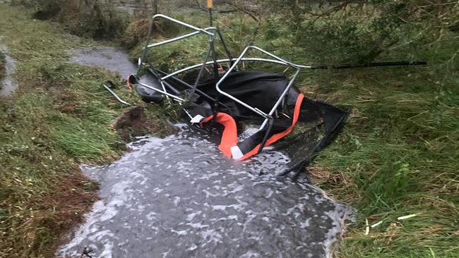 The family’s trampoline was a mangled mess down the street while the neighbour’s trampoline landed in their yard.