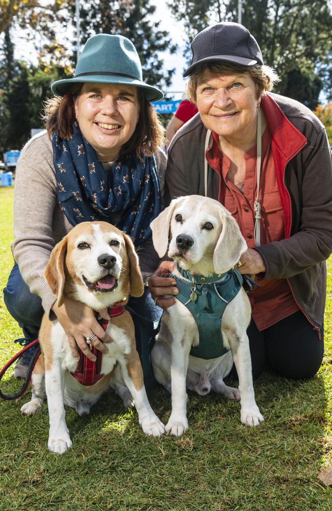 Kylie Wright with Bundy (left) and Wendy Wright with Baxter at Toowoomba's Million Paws Walk at Queens Park, Friday, May 24, 2024. Picture: Kevin Farmer