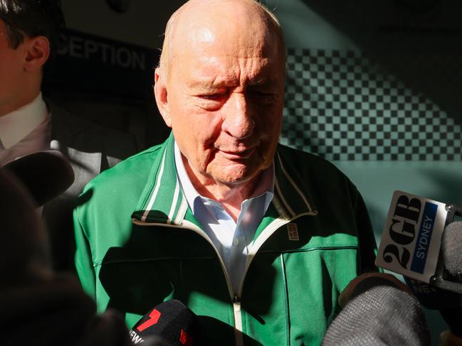 SYDNEY, AUSTRALIA - NewsWire Photos - November 18, 2024: Alan Jones pictured as he leaves Day St Police Station, in Sydney. Alan Jones has been charged by police over allegations the radio broadcaster and former Wallabies coach indecently assaulted, groped or inappropriately touched young men spanning two decades. Picture: NewsWire / Dylan Coker