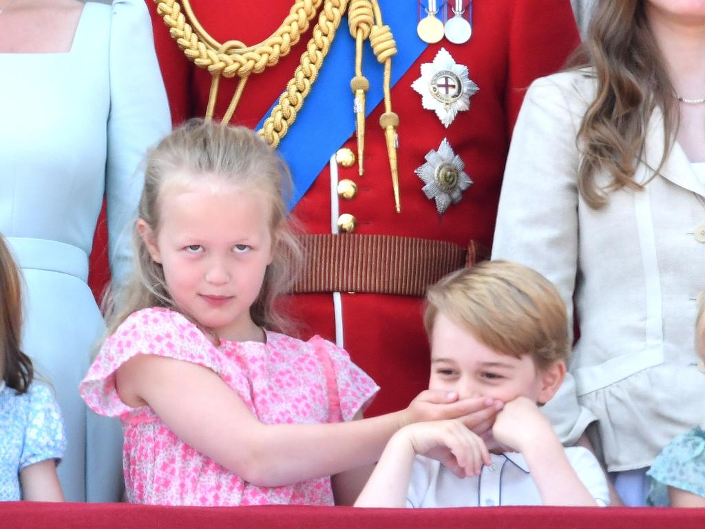 LONDON, ENGLAND - JUNE 09:  Prince William, Duke of Cambridge, Savannah Phillips and Prince George of Cambridge on the balcony of Buckingham Palace during Trooping The Colour 2018 at The Mall on June 9, 2018 in London, England. The annual ceremony involving over 1400 guardsmen and cavalry, is believed to have first been performed during the reign of King Charles II. The parade marks the official birthday of the Sovereign, even though the Queen's actual birthday is on April 21st.  (Photo by Karwai Tang/WireImage)