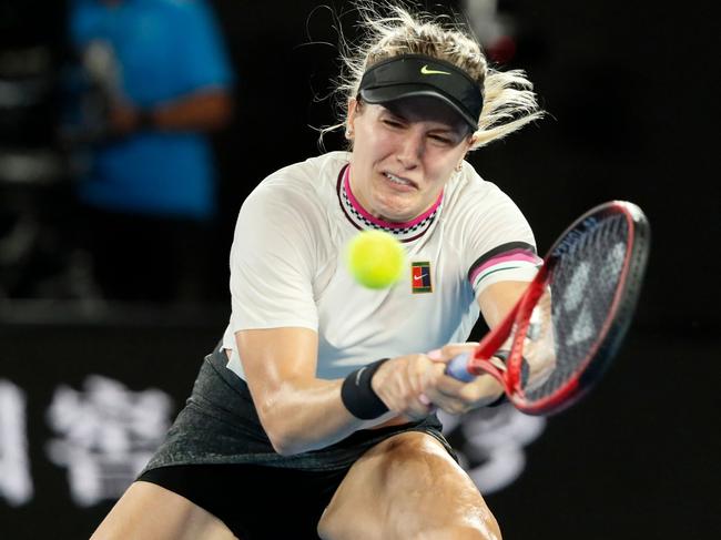 Canada's Eugenie Bouchard plays a backhand return during her loss to Serena Williams.