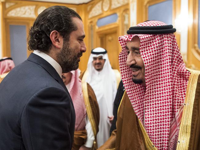 King Salman bin Abdulaziz al-Saud shaking hands with former Lebanese prime minister Saad Hariri in the capital Riyadh. Picture: AFP