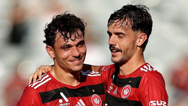 GOSFORD, AUSTRALIA - FEBRUARY 22: Dean Pelekanos of the Wanderers celebrates scoring a goal with team mates during the round 20 A-League Men match between Central Coast Mariners and Western Sydney Wanderers at Industree Group Stadium, on February 22, 2025, in Gosford, Australia. (Photo by Brendon Thorne/Getty Images)