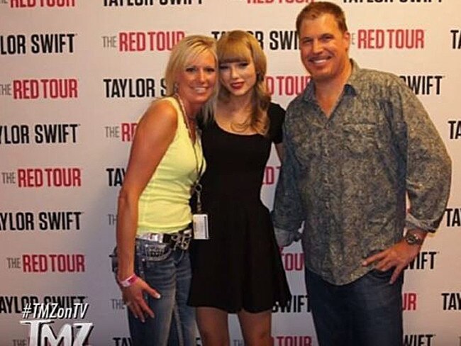 Taylor Swift poses with DJ David Mueller in the photo where he is allegedly groping the singer. Picture: TMZ