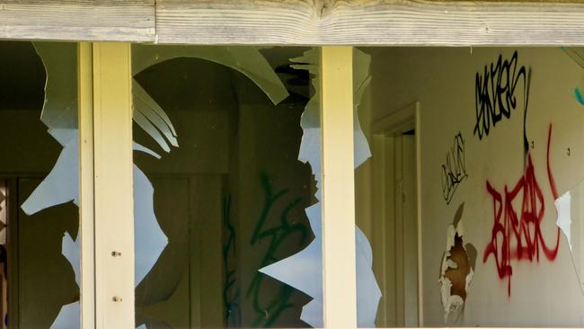 Broken windows and graffiti-covered walls at the former Berkeley Living retirement village.