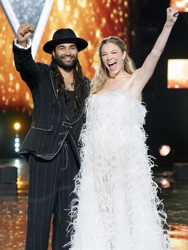 Reuben De Melo! He celebrates with coach LeAnn Rimes.