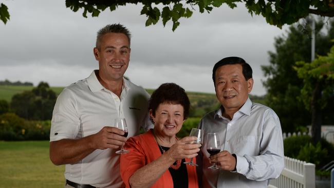 Former Onkaparinga chief executive Mark Dowd with former mayor Lorraine Rosenberg and magistrate Su Jingwen at the McLaren Vale Visitor Centre. Picture: Naomi Jellicoe