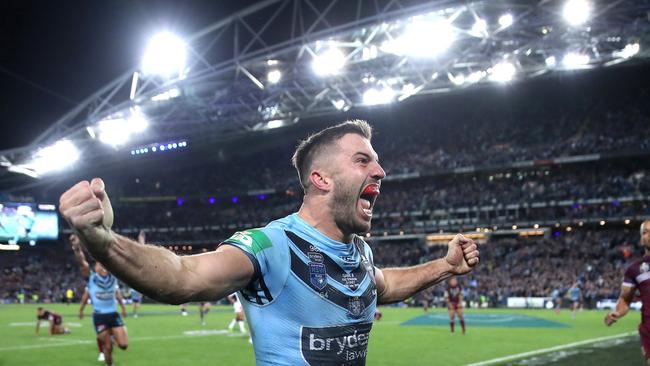 NSW's James Tedesco celebrates winning try with Mitchell Pearce during Game 3 of the State of Origin series between NSW Blues and Queensland at ANZ Stadium, July 10, 2019. Picture. Phil Hillyard