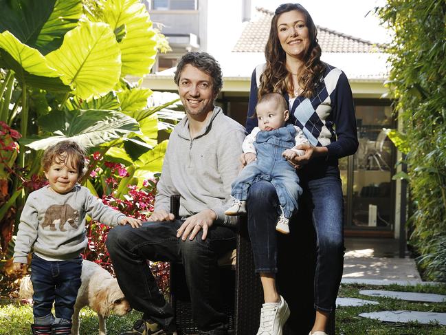 Melinda and Michael Strier pictured with kids Joshua (18mths) and Tobias (4mths) at their Randwick property which is currently up for sale. Picture: Sam Ruttyn