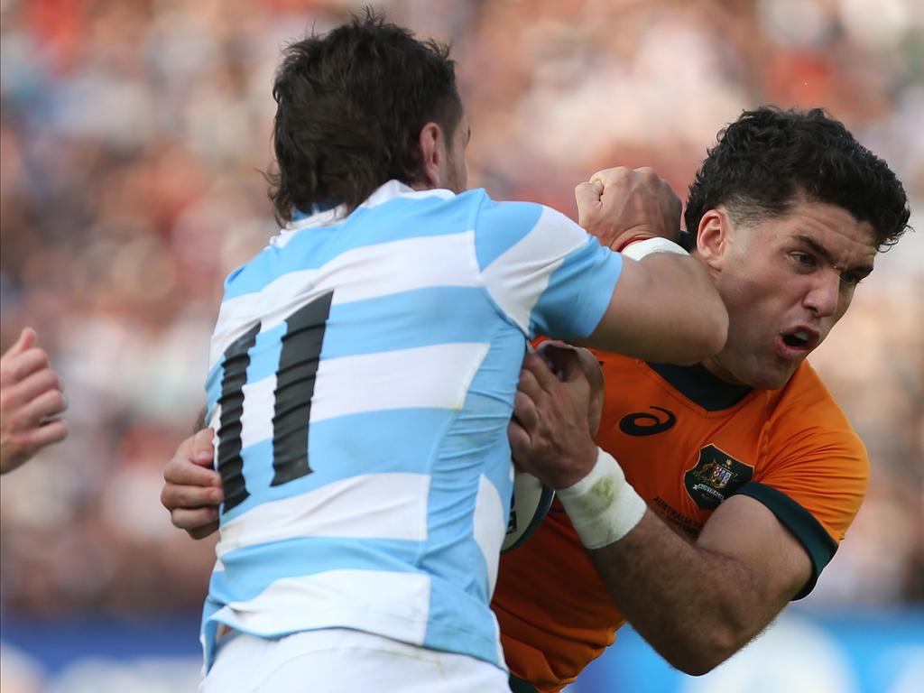 Argentina’s Mateo Carreras palms off Ben Donaldson during the embarrassing 67-27 loss. Picture: Getty Images