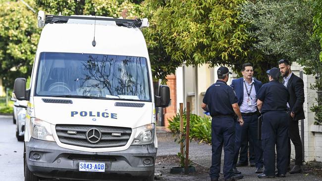 Police and detectives at the home of intensive care pediatrician Dr Michael Yung a day after he was assaulted during a break-in at his Gilberton home. Picture: Mark Brake