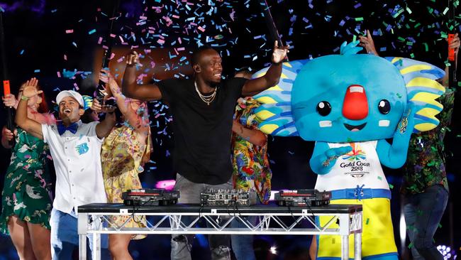 Usain Bolt performs during the Commonwealth Games closing ceremony with dancers and mascot Borobi. Picture: Michael Wilson