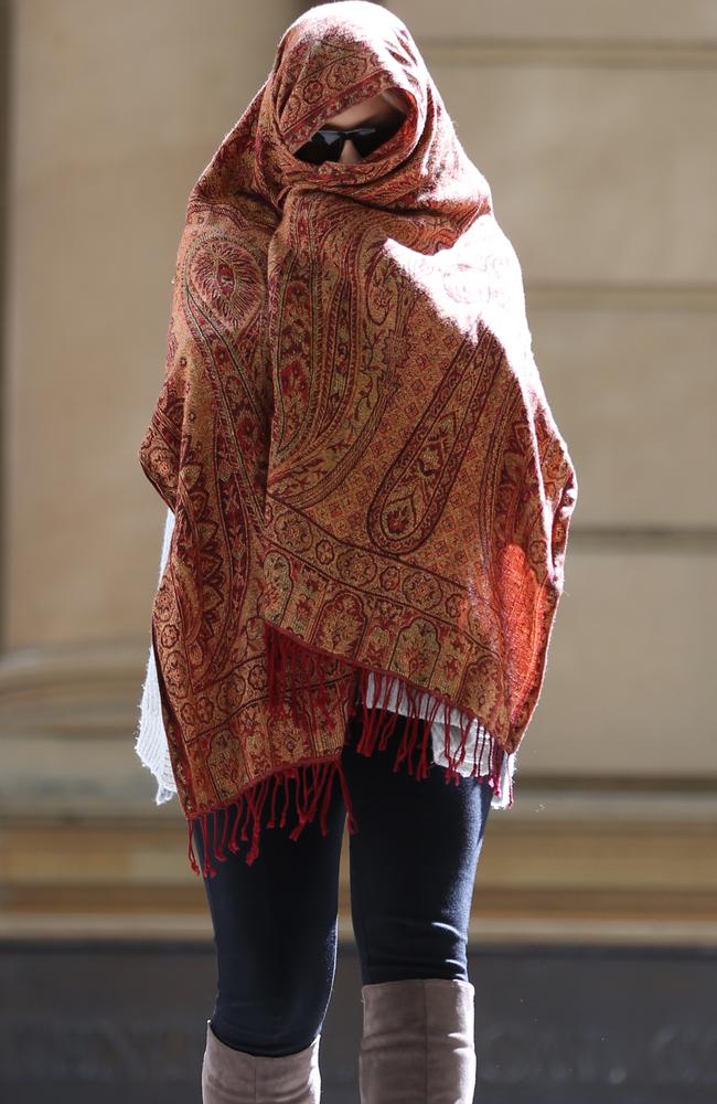 Andrew Grant’s partner leaves court during a previous hearing. Picture: John Grainger