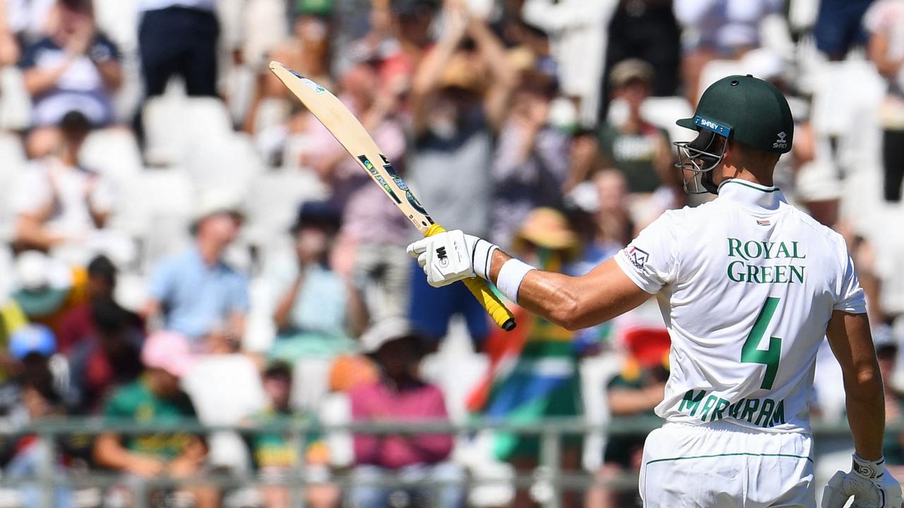 South Africa's Aiden Markram celebrates after scoring a half-century (50 runs) during the second day of the second cricket Test match between South Africa and India at Newlands stadium in Cape Town on January 4, 2024. (Photo by Rodger Bosch / AFP)