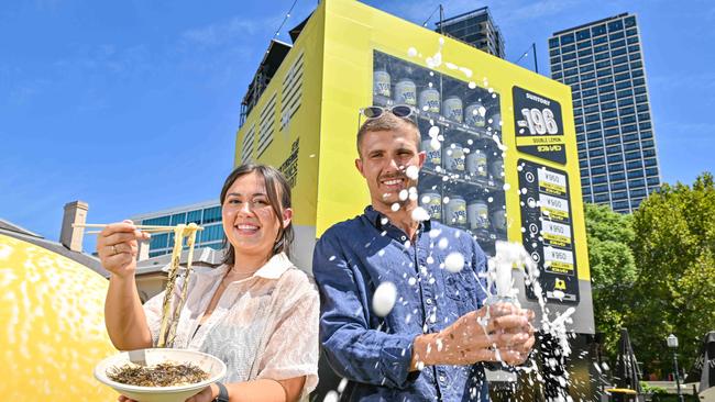 Shobosho co-owner Nicola Jacob and Adelaide Fringe dweller Marcus Roberts at the Minus – 196 Extreme Vending Machine at Ayers House. Picture: Brenton Edwards