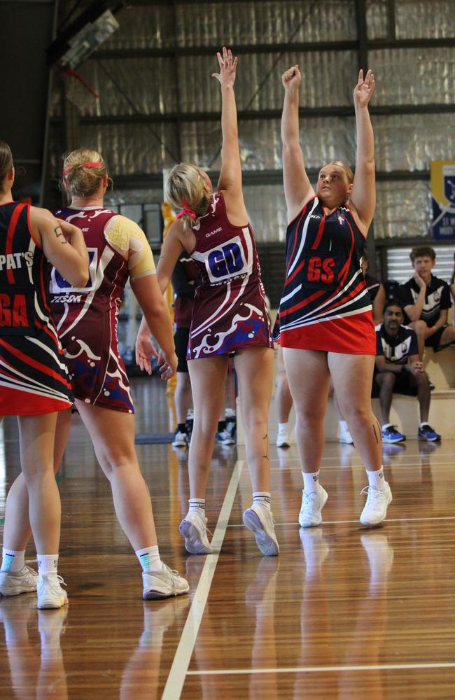 Netball action from QISSN 2024 in Townsville. Carmel College v Shalom College