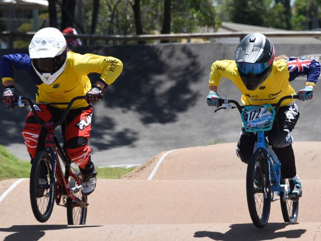 Leanna Curtis (black pants) and Saya Sakakibara (red pants) training for BMX.