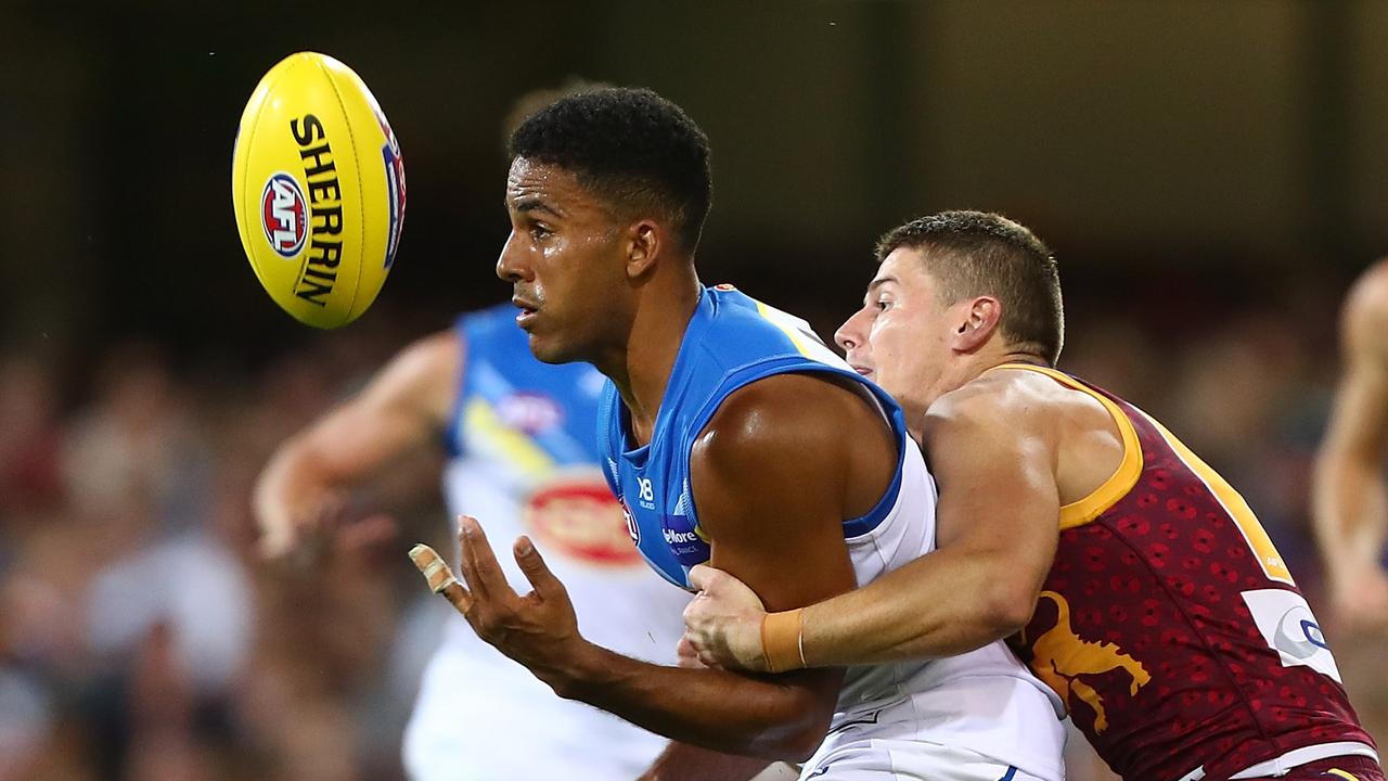 Touk Miller and Dayne Zorko will resume their rivalry in the QClash this weekend. Photo: Chris Hyde/Getty Images.