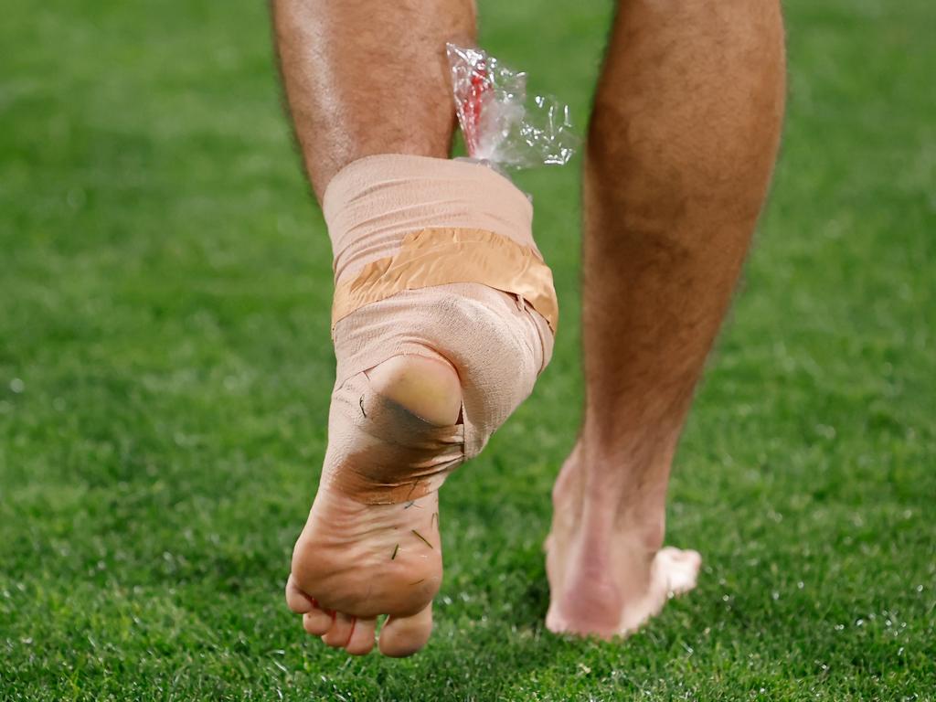 McDonald with ice on his ankle immediately after the win over Port Adelaide. Picture: Dylan Burns/AFL Photos via Getty Images