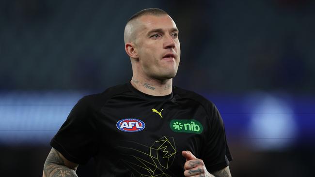 MELBOURNE, AUSTRALIA - AUGUST 03: Dustin Martin of the Tigers warms up before the round 21 AFL match between North Melbourne Kangaroos and Richmond Tigers at Marvel Stadium, on August 03, 2024, in Melbourne, Australia. (Photo by Daniel Pockett/Getty Images)