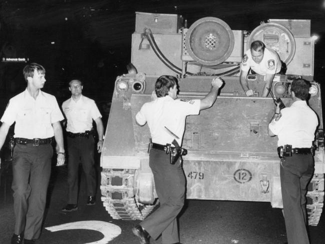 Police at the scene after a stolen armoured vehicle was dramatically stopped on Sydney Harbour Bridge in 1986. File picture