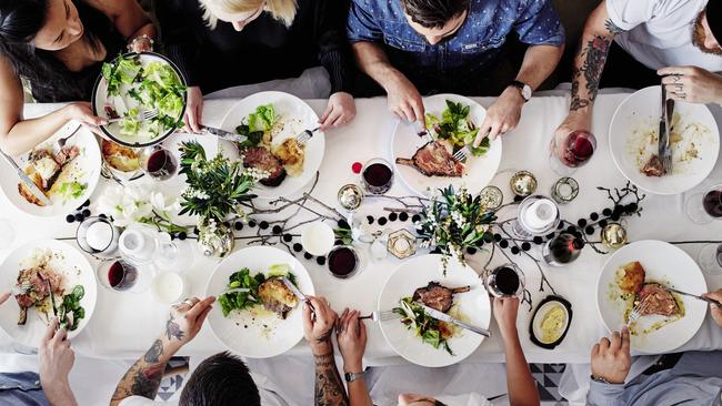 A scene that’s going to become increasingly rare - diners around a restaurant table.