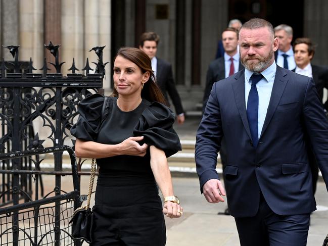 Coleen Rooney departs with husband Wayne Rooney. Picture: Getty Images.