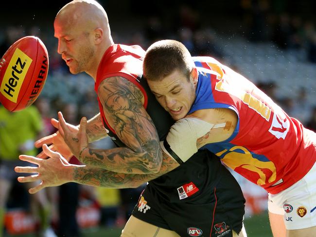 Nathan Jones is tackled by Claye Beams. Picture: Colleen Petch