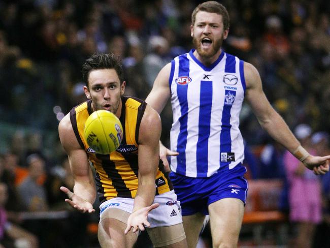 Jack Gunston takes an easy mark in front of Lachie Hansen. Picture: Colleen Petch