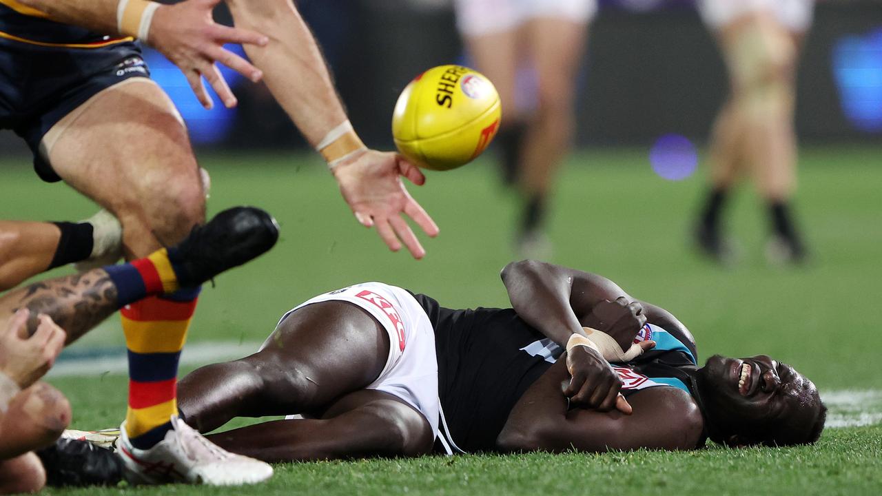 Aliir Aliir was in a bad way. Photo by Sarah Reed/AFL Photos via Getty Images.