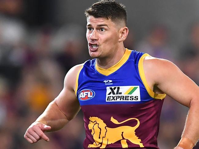 BRISBANE, AUSTRALIA - APRIL 14: Dayne Zorko of the Lions shouts at his team mates after Reef McInnes of the Magpies kicked a goal during the round five AFL match between the Brisbane Lions and the Collingwood Magpies at The Gabba on April 14, 2022 in Brisbane, Australia. (Photo by Albert Perez/AFL Photos/Getty Images)