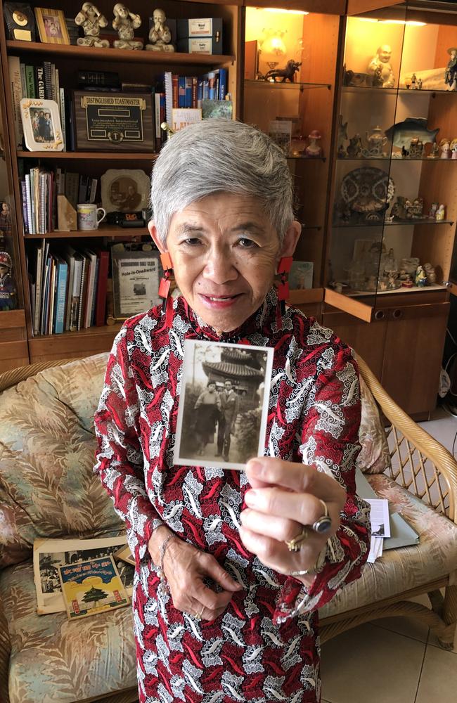 Sally Rippingdale, 78, at her home in Sydney with a photo of her parents H.P. Pang and Choon Ping, probably pictured in the 1930s.